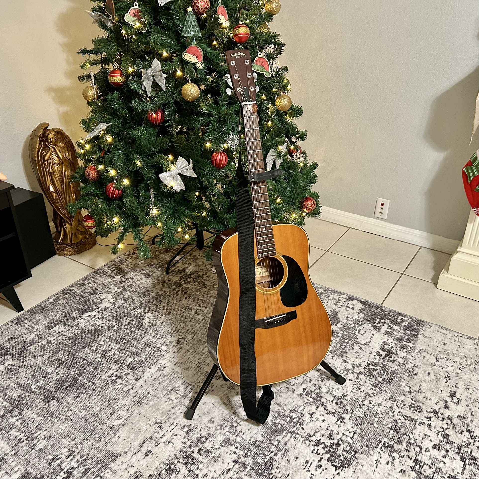 Acoustic guitar No Case No Stand Guitar And Strappe only