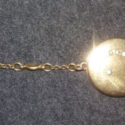 Gold filled charm from 1874