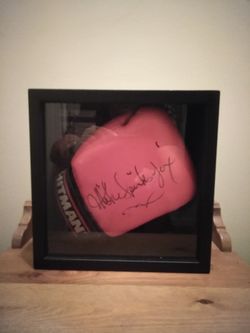 Authentic hand signed Michael spinks hitman boxing glove with JSA certificate of authenticity