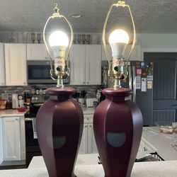 Set of two burgundy colored lamps