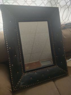 Vintage leather or vinyl mirror