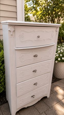 Ashley Furniture 5 drawer dresser. Has some blue marks but easy wipe down