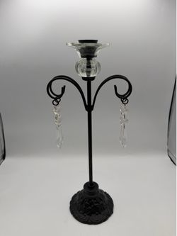 Vintage  black metal candelabra featuring delicate clear glass drop crystals and a tulip-shaped candle cup