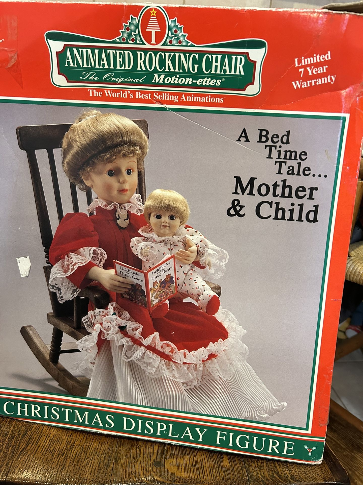 Mother And Child Figures In Rocking Chair