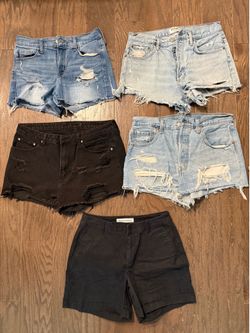 Five pairs of shorts - size 6/8