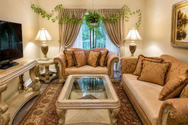 Premium Hand-Carved Living Room Set – Sofa, Loveseat, Ottoman, Coffee Table & End Tables