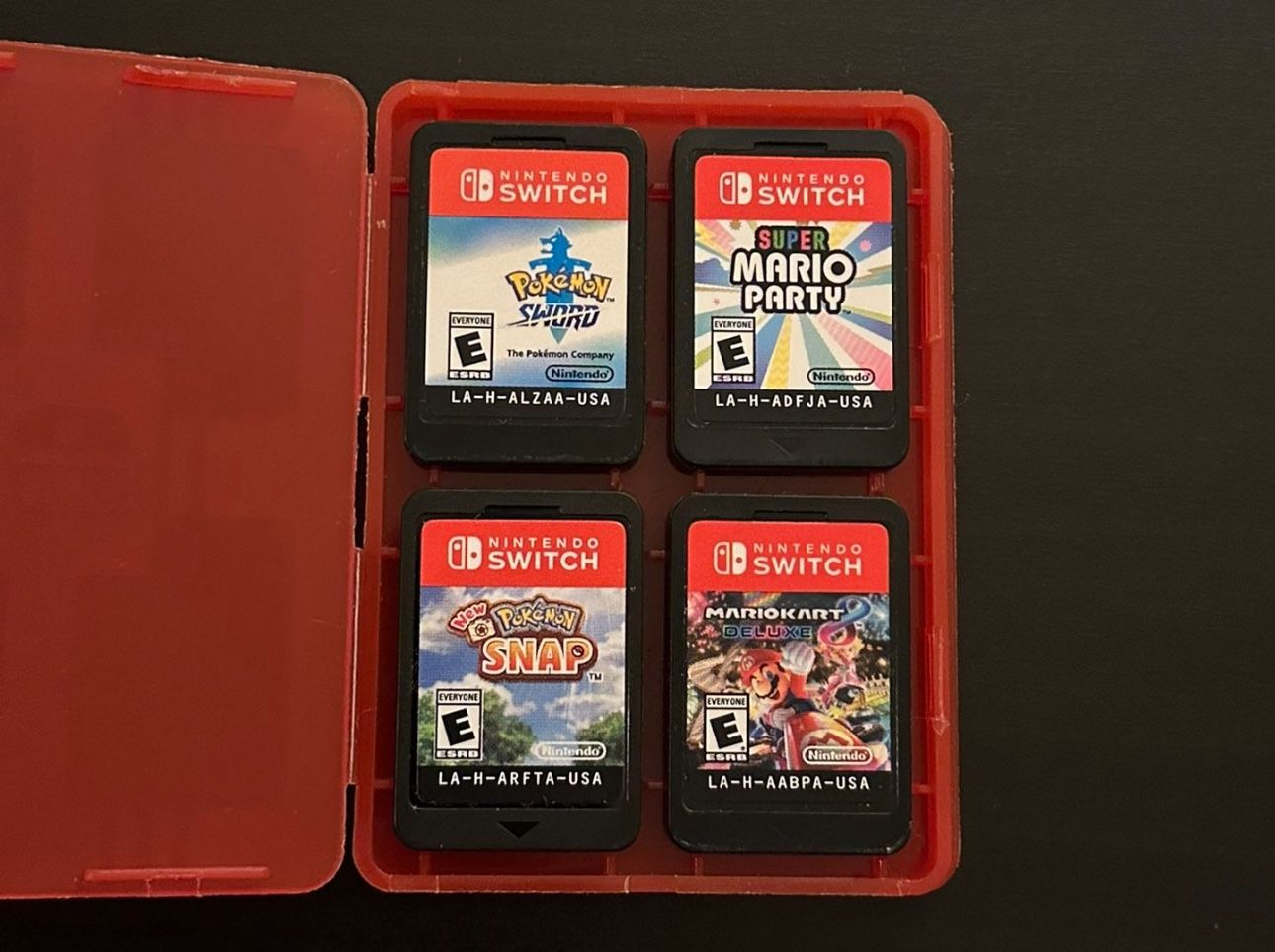 Nintendo Switch games - Mario Party, Mario Kart, Pokemon Sword, Pokemon Snap