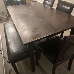 Dining table with 4 chairs and farmer's bench