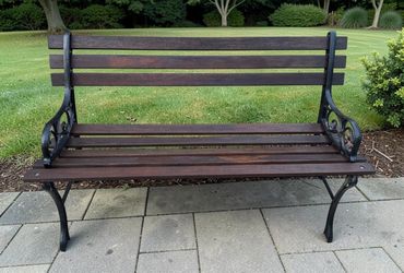 Garden Bench with Dark Wood Slats and ornate Scrollwork Cast Iron Side Frames - 48x19x26”