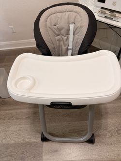 High Chair And Baby Carrier