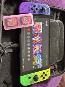 Nintendo Switch with Splatoon Joy-Cons and Games