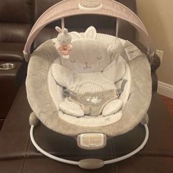 Ingenuity Twinkle Tails Vibrating Infant Baby Bouncer with Lightning Toy Bar and Pillow