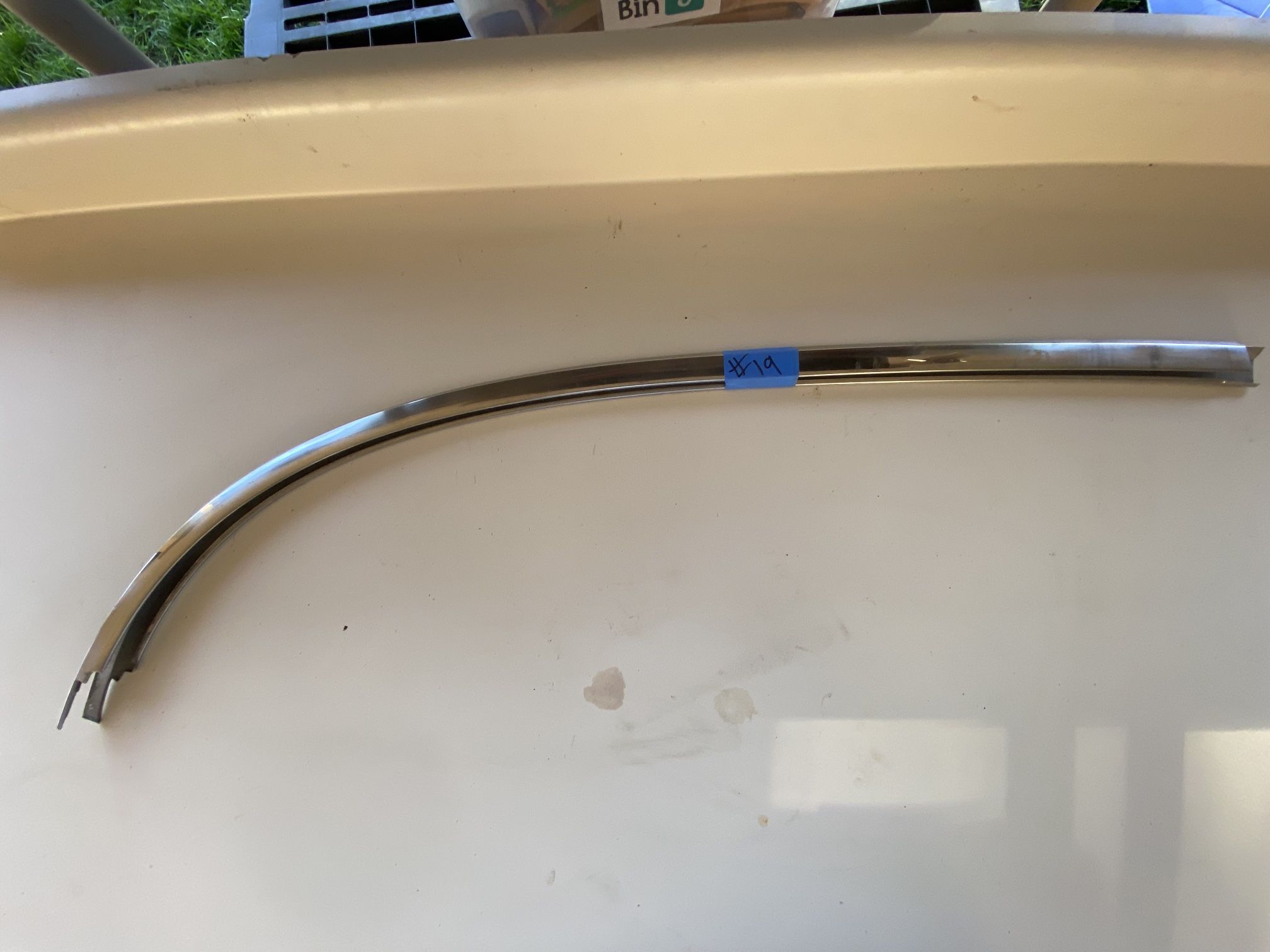 63-64 Chevrolet Impala Lower windshield reveal trim molding pair