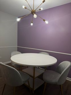 White dining table and grey chairs
