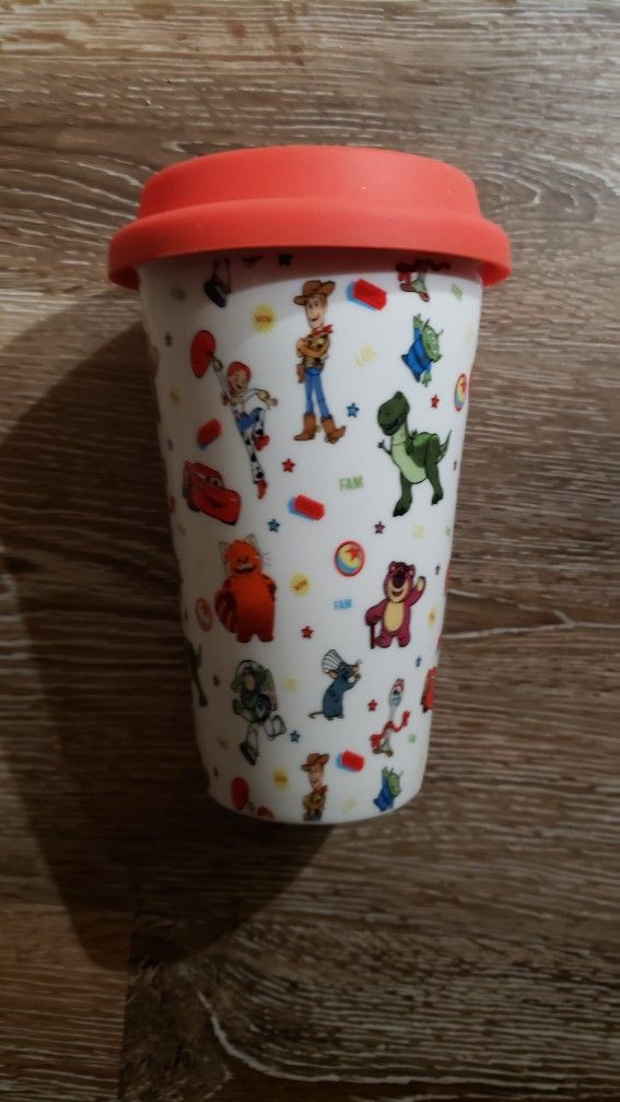 New disney ceramic tumbler of toy story with silicone lid ..