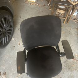used Steelcase Leap V2 Ergonomic Office Chair in black fabric. It features LiveBack technology that changes shape to support the spine, adjustable sea