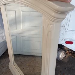 Dresser's And A Mirror 