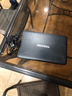 Toshiba laptop with charger and running smoothly. Good for school work or jobs