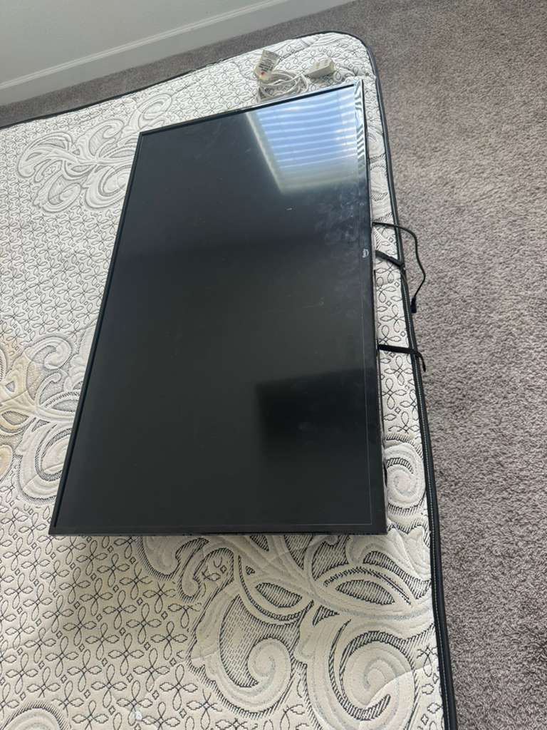 Flat screen TV in good condition. Works perfectly, no issues. Comes with power cable. Great for living room or bedroom.”
