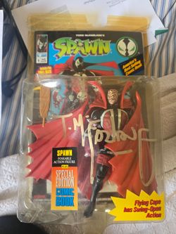 Signed spawn figure.