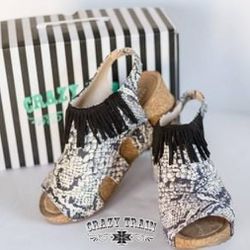 Crazy Train Stomp Right There Snake Black Wedges W/Fringe Size 7

New With Tags!

**Bundle and save with combined shipping**
l