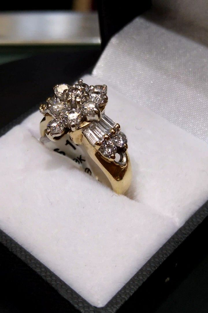 10k Ladys Ring With Round And Bagget Diamonds. Missing One Round Stone