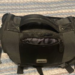 Black Nikon Digital Camera With Case And Extra Lens 