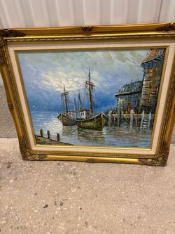 A vintage nautical fishing boat scene oil painting signed by the artist "Marvik". .. framed in a wood gold frame 25” x 21” . $250
