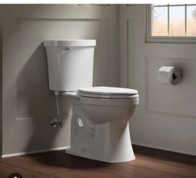 Kohler Maxton™ The Complete Solution® toilet two-piece elongated Brand New