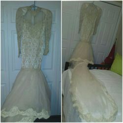 Wedding dress off white- hade made- Mermaid style size 5 with pearls and sequence used once.
