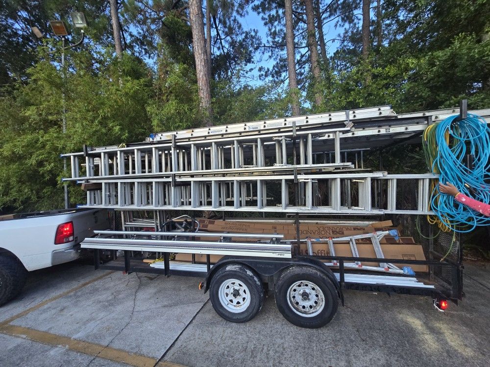 16' trailer with lots of stairs and a folding machine