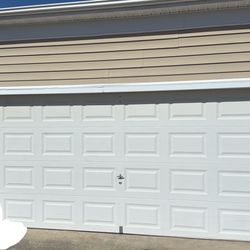 18’ x 7” Garage Door W/ Recently Installed Operator.