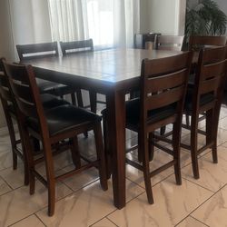 Dinning height table (8 chairs)