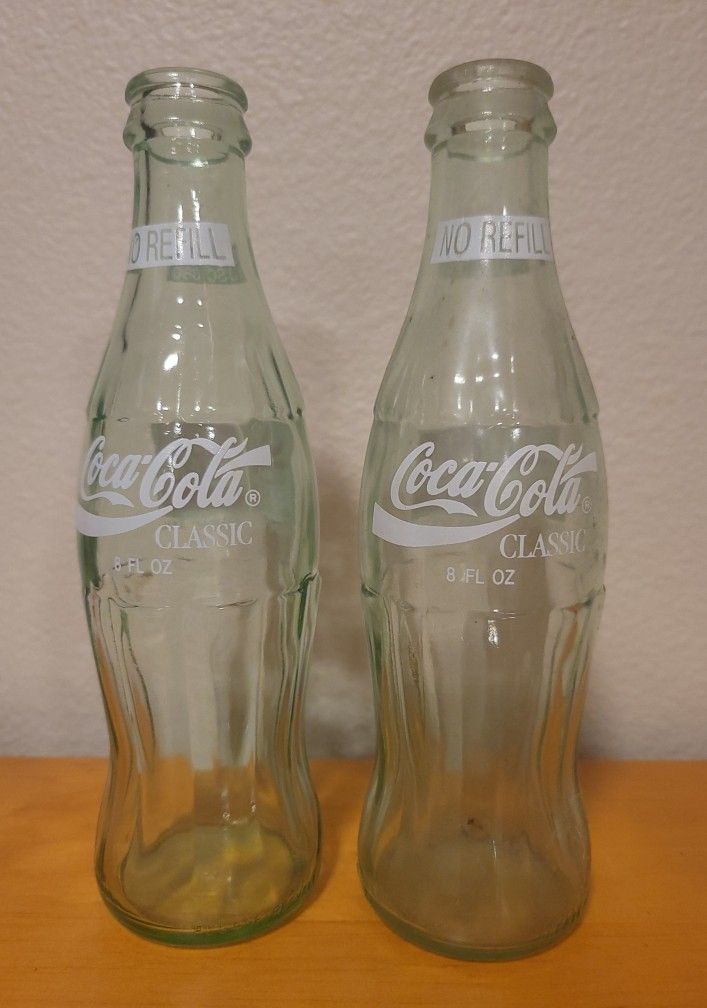 8 oz Coca Cola Classic bottle. Barcelona '92. Sharing The Olympic Ideal
- 2 Bottles