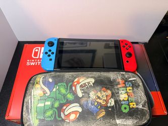 Nintendo Switch with Joy-Cons and Carry Case