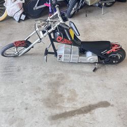 Razor Mini Chopper Electric Bike featuring red flame