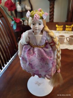 Proclaim doll seven to eight inches tall