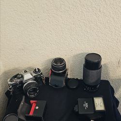 Olympus OM-10 35mm Film Camera with 50mm lens, all Addl Lenses/Flash Included