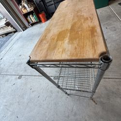 Kitchen storage rack with wine shelf