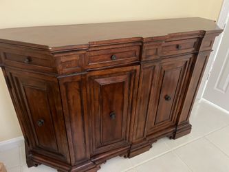 Well maintained and heavy wood credenza