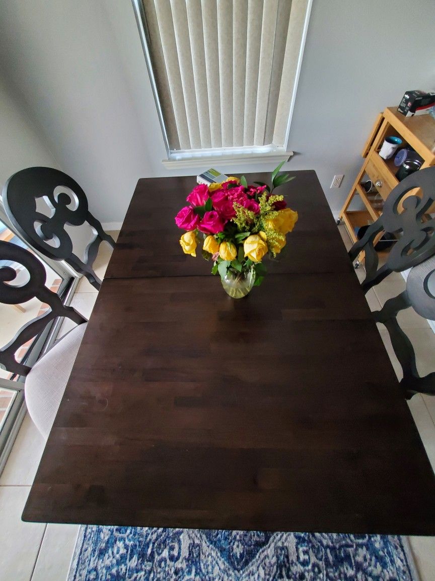 Dining Table With Self Storing Leaf