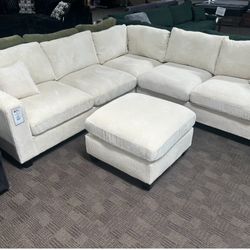 Beige Sectional Sofa And Ottoman 