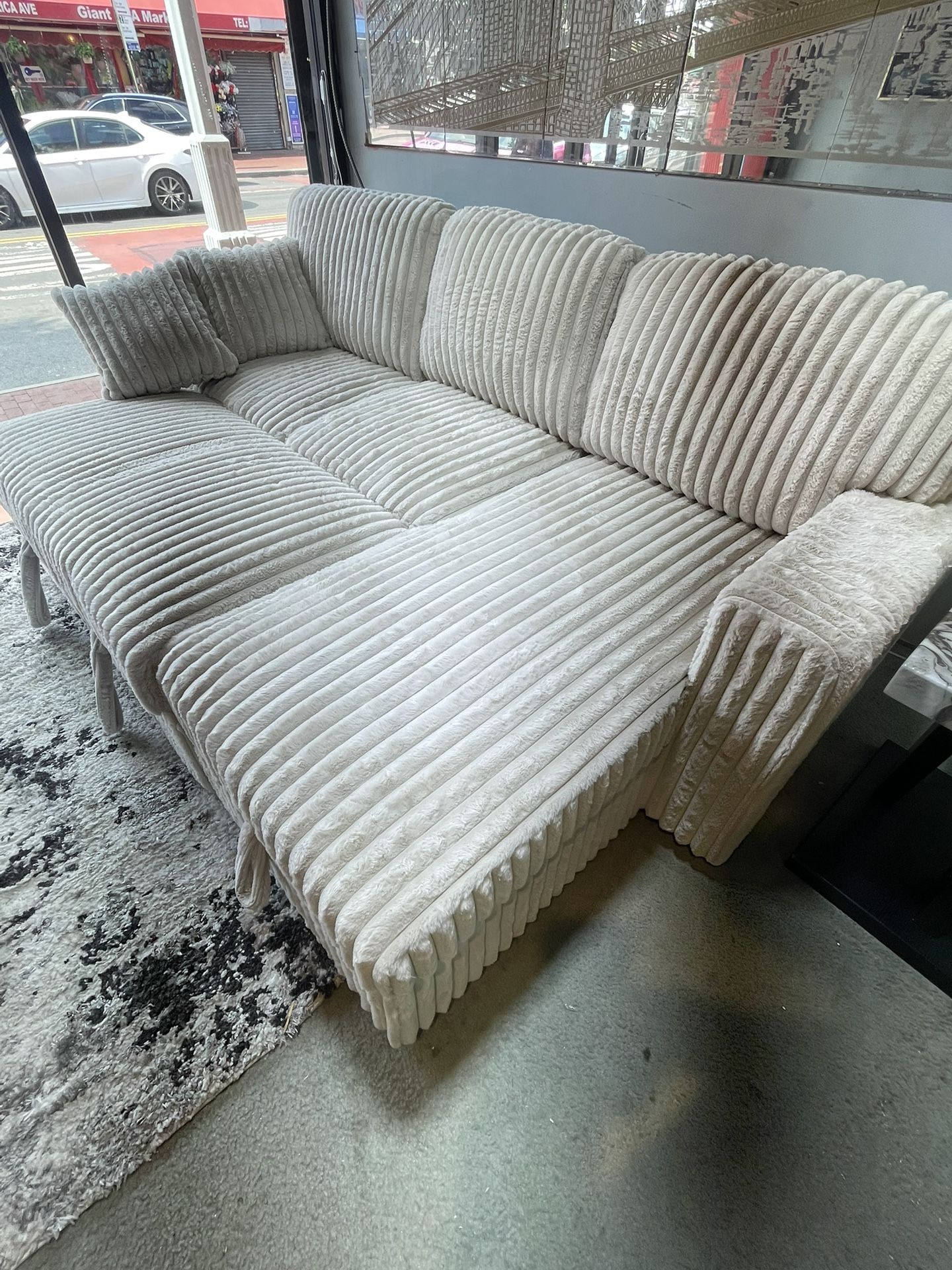 Soft Like Silk Reversible sectional w/Pull out bed On Sale Now!