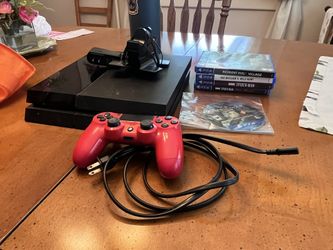 PS4 with Controller and Games