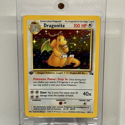 dragonite pokemon card 4 62 Dragonite Fossil 1st Edition Holo 4/62 PSA 8 – TBC Games
