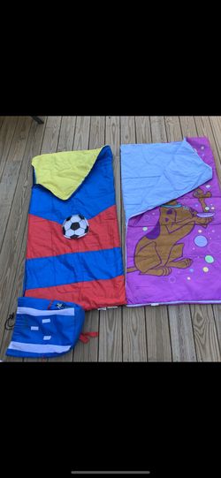 2 sleeping bags and one backpack