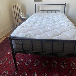 Twin Bed Mattress And Black Metal Bedframe