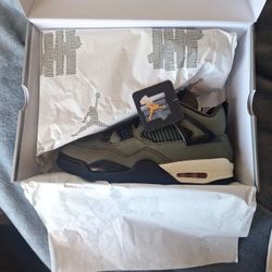 BRAND NEW UNDEFEATED JORDAN 4 SIZE 10.5. 