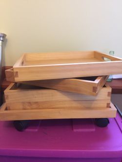 Wooden trays with carried