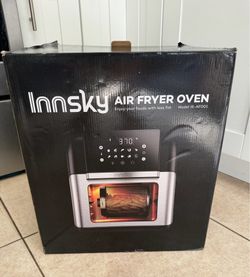 Innsky 10.6-quart air fryer oven, model IS-AF001, which features rotisserie and dehydrator functions.